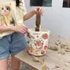 Venta al por mayor del fabricante Bolso de mano artístico de moda Bolso de lona Bolso tipo cubo de gran capacidad para mujer 2026 Nuevo Bolso para almuerzo de trabajo