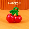 Simulación de dibujos animados miniatura color sólido cinturón colgante fruta resina DIY llavero pequeño colgante accesorios de joyería material al por mayor