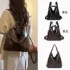 La popular bandolera de este año en estilo de moda europeo y americano, una bolsa de mano casual de gran capacidad que se puede llevar en la mano o usar como mochila