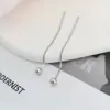Los pendientes de cuentas redondas de Lanlan son sencillos y elegantes, con un aire de alta gama, pendientes largos con borlas para mujer