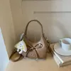 Elegante Bolso Xiaomi Mijia Niche de Lazo para Mujer 2026 Otoño Nuevo Estilo Bolso de Media Luna Texturizado para el Trabajo Bolso Dumpling Bolso Cruzado de Moda