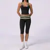 Camisola de yoga estilo europeo y americano con cuello halter de tacto desnudo, tipo dos piezas falsas, adelgazante y levantadora de glúteos, adecuada para deportes casuales y fitness