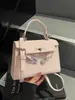 Bolsa Platinum da Moda para o Trabalho para Mulheres 2026 Primavera Novo Estilo Bolsa de Mão Casual Versátil Bolsa Caixa Vermelha Bolsa Transversal de Ombro