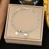 Joias de Aço Titânio Dongguan, Corrente de Lâmina Dupla Estilo Hip-Hop Europeu e Americano Personalizada e Exagerada, Pulseira Não Desbota para Mulheres, Fashion para o Dia a Dia