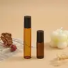 Botella de vidrio ámbar opaca con tapa negra, frasco para aceites esenciales, frasco dispensador de muestras de perfume, botella vacía cosmética portátil al por mayor