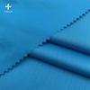 Espiga sesgada flor caliente antisalpicaduras tela patrón espiga jacquard poliéster chaleco plumífero tela para chaqueta acolchada de algodón al por mayor