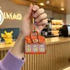 Mini bolso colgante para el hogar, bolso pequeño, bonito bolso, nuevo, a la moda, con colgante, boca, sobre rojo, bolso para auriculares, llave de coche