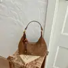 Bolso de mano de gamuza de moda con forma de media luna para mujer, nuevo estilo 2026, bolso de hombro a la moda, chic y retro, bolso cruzado de nicho