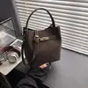 Bolso Texturizado para Mujer 2026 Primavera Nuevo Bolso de Hombro para Viajes Cotidianos Moda Simple Bolso Madre-Hijo Bolso de Hombro Único Cruzado