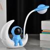 Nueva lámpara de mesa recargable creativa de astronauta, decoración de habitación infantil de hombre espacial, lámpara de mesa para lectura de estudiantes, regalo de temporada de apertura