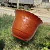 Venta al por mayor de macetas de plástico gruesas, redondas y profundas para plantas de base, para hortalizas, crisantemos y rosas.