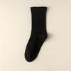 Otoño e Invierno nuevos calcetines para mujer dopamina color sólido sin costuras media pantorrilla holgados calcetines de confinamiento algodón estilo japonés calcetines para mujer al por mayor