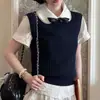 Conjunto de três peças estilo coreano doce: colete curto listrado + camisa de manga curta com lapela + saia branca