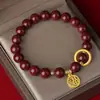 Pulsera anillo Ruyi de moda nacional pulsera con colgante de carácter Fu de cinabrio sintético diseño ins elegante de alta gama regalo