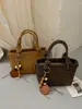 Otoño 2026 Nuevo Estilo Coreano Bolso de Mano Sencillo Bolso Cubo Sencillo de Moda Bolso de Hombro Único con Textura Bolso Cruzado