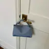Elegante y chic bolso de mano tipo dumpling para mujer, nuevo modelo otoño e invierno 2026, patchwork de estampado de leopardo de lujo ligero para uso diario, bolso de hombro y cruzado