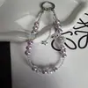 Nueva y versátil cadena de perlas y cristal para teléfono con colgante de estrella, correa para teléfono, correa de muñeca y accesorio para bolso