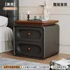 Mesita de noche usada para dormitorio en casa 2026 Nuevo Crema Lujo Ligero Sensación de Alta Gama Madera Maciza Pequeño Gabinete de Almacenamiento de Mesita de Noche