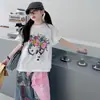 Conjunto Denim Estampado Manga Curta para Meninas 2026 Novo Estilo Coreano Camiseta Cartoon Calça Wide-Leg Grafite Conjunto de Duas Peças Tendência