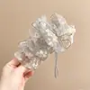 Pinza Plátano Plisada Vertical con Lazo Floral para Cola de Caballo de Verano 2026 Nuevos Pasadores para la Parte Posterior de la Cabeza Accesorios para el Cabello