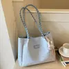 Bolso de Hombro Cruzado de Verano 2026 Nuevo Moderno de Gran Capacidad Alto Valor para Debajo del Brazo Bolso Tote Versátil para Viajes Diarios