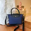 Bolso de mano de moda para mujer 2026 nuevo bolso tote de gran capacidad bolso cruzado casual bolso de hombro versátil para el día a día