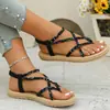 Sandalias planas de estilo étnico nuevas transfronterizas para mujer talla grande con bloques de color, banda elástica tejida, chanclas, zapatos de playa, fuente de deseos