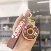 Pingente de chaveiro de rosquinha de simulação realista, pequeno presente para bolsas de casais, decoração de máquina de fliperama para atacado