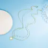 Collar de perlas en forma de corazón de doble capa para mujer, con un diseño lujoso y sofisticado, un estilo único y moderno, y un popular collar de cadena para la clavícula, nuevo para 2022