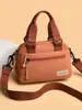 Bolsa Feminina Moderna e Estilosa 2026 Novo Modelo Simples Leve Bolsa de Ombro Versátil Impermeável Nylon Bolsa Transversal Bolsa de Mãe