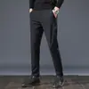Pantalones casuales de negocios para hombre, nueva colección 2026, corte slim, pierna recta, tela de seda de hielo, ligeros, elásticos, versátiles y de secado rápido