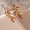 Aretes Redondos Lisos Chapados en Oro ~ Aretes Redondos Metálicos Brillantes, Aretes de Estilo Minimalista Transfronterizo Europeo y Americano, Aretes de Lujo Ligero y de Alta Gama
