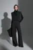 Chaleco de punto suelto adelgazante con cuello alto apilado estilo francés y pantalones rectos de pierna ancha para otoño-invierno, modelo nuevo de nicho 2026