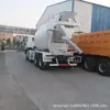 Fornecimento transfronteiriço de caminhões betoneira Howo usados, grandes caminhões betoneira Howo NX371 de 10 metros cúbicos com tração nas quatro rodas na frente e tração nas oito rodas atrás