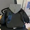 Roupa de Outono Infantil Estilosa Meninas Novidades Outono 2026 Crianças Meninos Meninas Bebê Jaqueta de Couro Top de Couro Tendência