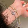 Pulsera de Delfín Chapada en Oro Real 2025 Estilo Exquisito Popular en Internet Cuerda de Mano de Moda Completamente Diamantada para Mano OL Joyería para Mujer