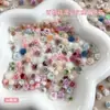 Ornamentos para uñas camelia mixtos tridimensionales color flor de rosa diamantes para uñas bolsa de materiales adorno adornos pequeños