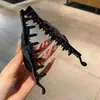 Nuevo estilo pinza de plátano vertical con lazo de pedrería para mujer, pinza para el pelo fácil de usar con un toque de alta gama, accesorio para el pelo de pinza de garra para recogido de coleta negra