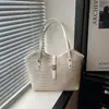 Bolso tote de gran capacidad para vacaciones en la playa y el trabajo, cierre de broche simple, bolso de hombro tejido de moda de alta gama estilo coreano