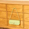 Bolso de axila de nicho de alta gama estilo coreano, bolso de mano versátil chic vintage, bolso baguette simple personalizado para el día a día