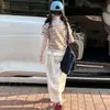 Camisetas de rayas para niñas de verano al por mayor transfronterizo 2026 nueva ropa infantil tops delgados elegantes de manga corta para niños mayores