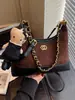 Bolso cubo único con patrón de diamantes para mujer, nuevo otoño 2026, moda vintage de alta gama, para hombro, cruzado y de mano