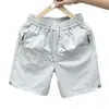 Novedad de Verano Versátil Delgados Lisos Rectos Secado Rápido Casual Pantalones Cortos para Hombre Estilo Hong Kong Modernos Versátiles Simples Pantalones de Cinco Puntos