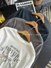 ¡Comodidad inmejorable! ~ Sudadera con cuello redondo y estampado de letras retro americano para mujer, nuevo modelo 2026, top holgado de manga larga con cordón