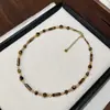 Collar Elegante de Gama Alta con Cuentas de Piedra Ojo de Tigre Blanco Retro Maillard Nuevo Diseño de Nicho Collar de Cristal para Mujer