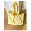 Bolsa de Lona Grande Capacidade Verão 2026 Bolsa Tote Simples com Bordado de Letras para Mulheres Versátil Nova Bolsa Tote de Grande Capacidade