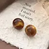 Pendientes de botón redondos de resina con ojo de gato, color degradado, color caramelo, aguja de plata, estilo niche, suaves, para uso diario, versátiles, para ir al trabajo, para mujer