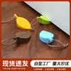 Batente de porta de silicone anti-colisão para portas e janelas, batente de porta portátil à prova de vento, batente de porta em formato de folha, protetor de porta seguro para bebês para evitar que os dedos sejam esmagados, batente de porta sem perfuração