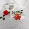 Venta al por mayor en fábrica punto dos capas Phnom Penh flor de Navidad flor de simulación colgante de árbol de Navidad decoración navideña accesorios de corona de flores