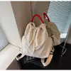 Mochila de Lona Transfronteiriça Feminina Grande Capacidade Casual com Cordão Bolsa Escolar Estudante Mochila de Montanhismo Mochila de Viagem Leve